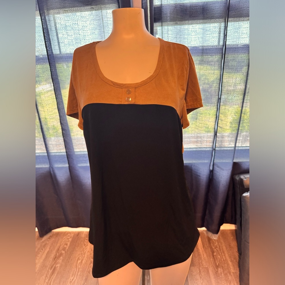 Sway and black blouse
